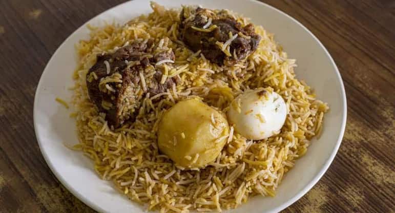 Arita di biriyani, Biriyani lovers Dada Boudi Biryani House, Uttarpara, Kolkata | Zomato